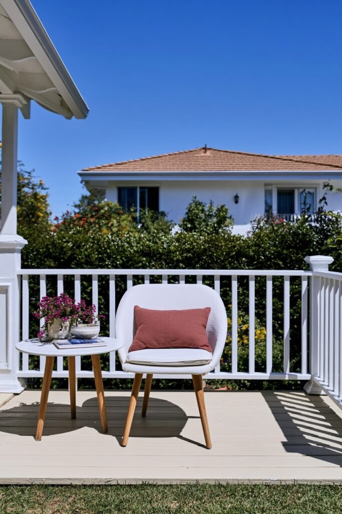 Porch chair with a fresh plaid cushion cover for fall
