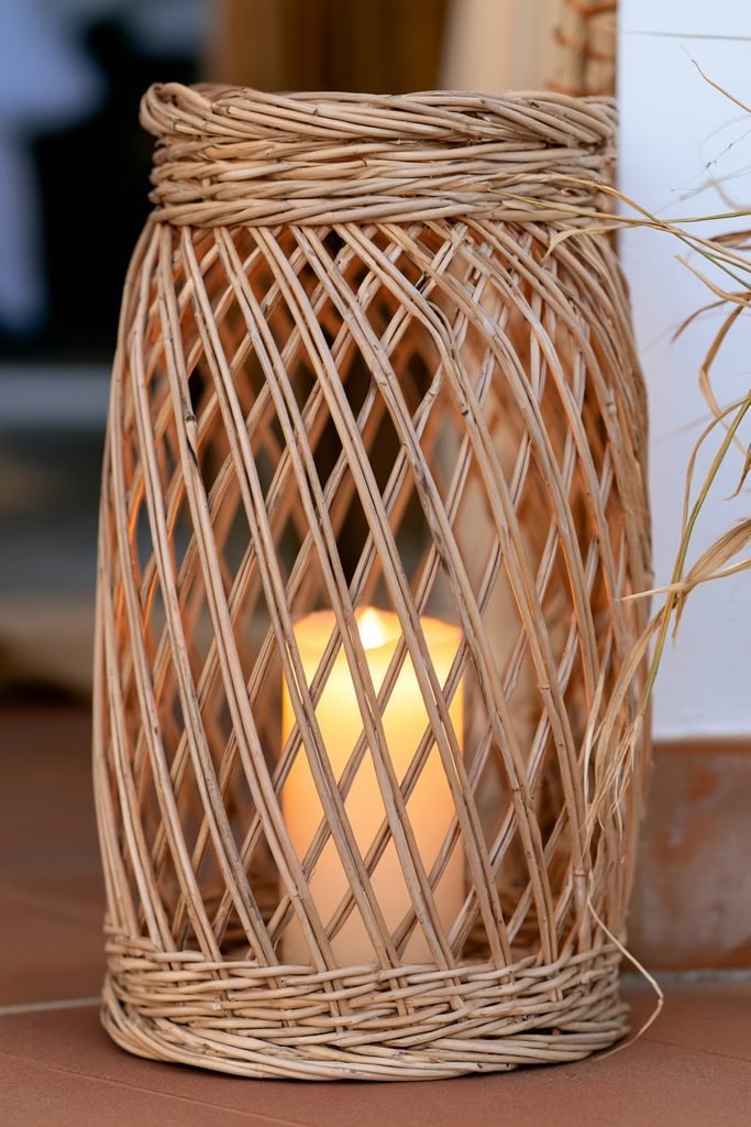 Woven rattan lanterns arranged along one side of a realistic wooden porch staircase