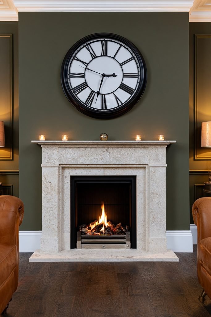 Cozy New Year's Eve living room with glowing fireplace, candles, and statement wall clock