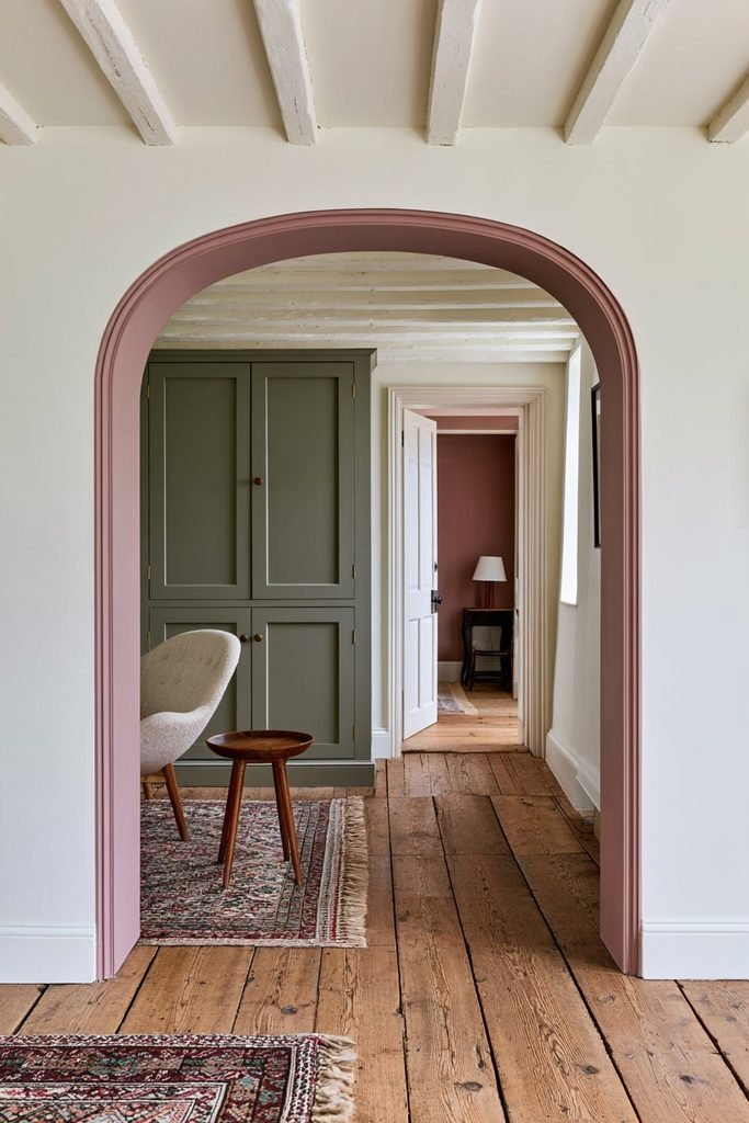 Shallow segmental arched doorway designed for a low-ceiling cottage interior.