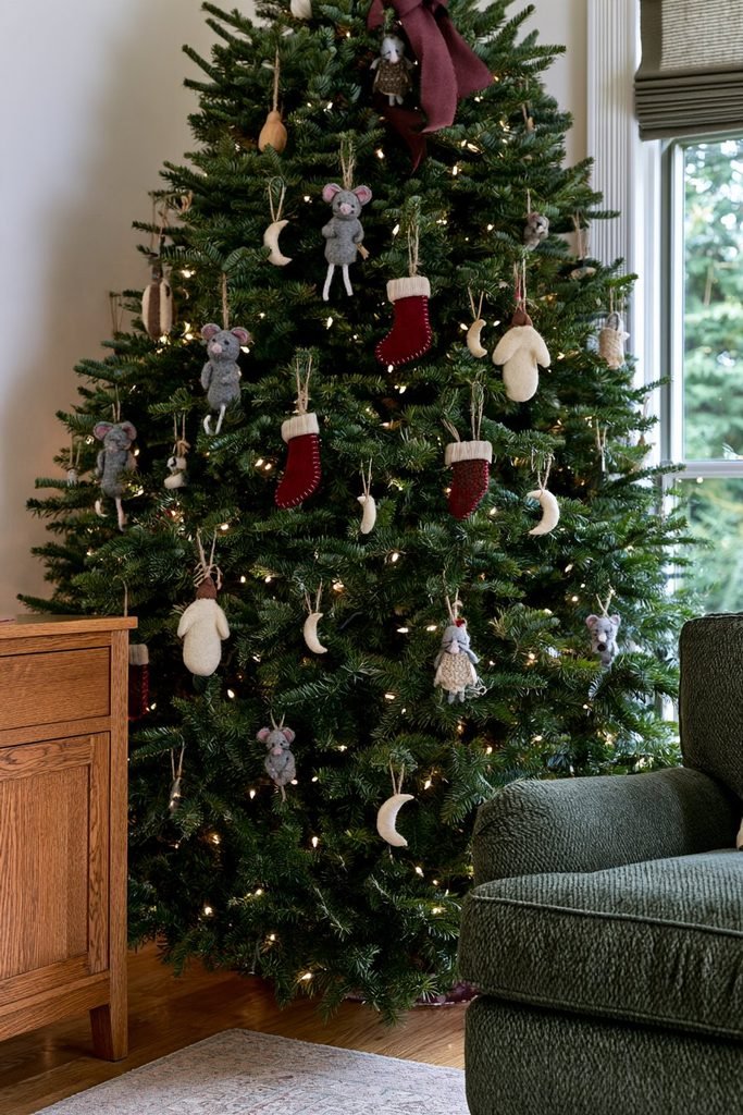 Hand-sewn felt Christmas ornaments inspired by The Night Before Christmas poem, including tiny mice, stockings, and reindeer.