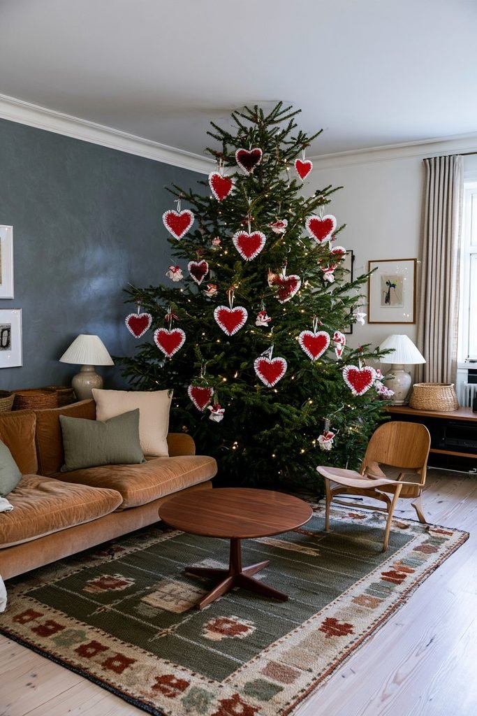 Scandinavian living room with a Christmas tree decorated with handmade red and white woven heart baskets, warm furnishings, and natural Nordic decorations.